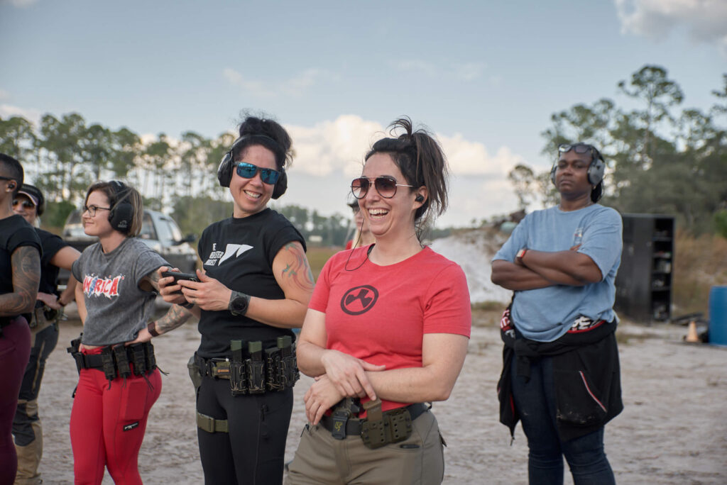 instructor and students laughing