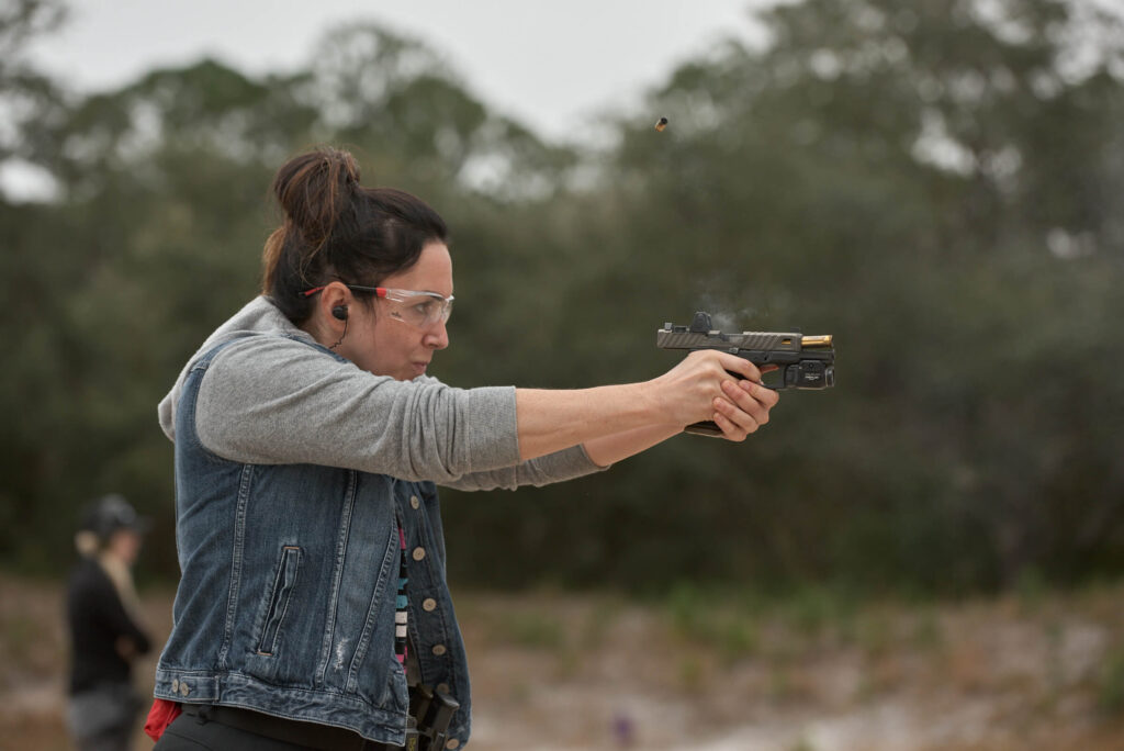 instructor shooting a firearm